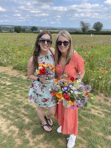 Emma and Karen at the Flower Belt with their blooms